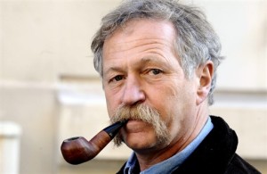French anti-globalisation activist Jose Bove smokes the pipe as he arrives to attend on October 20, 2008 in Paris a presentation of the alliance 